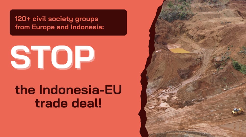 Cartel con el lema «¡STOP el acuerdo comercial entre Indonesia y la UE!».